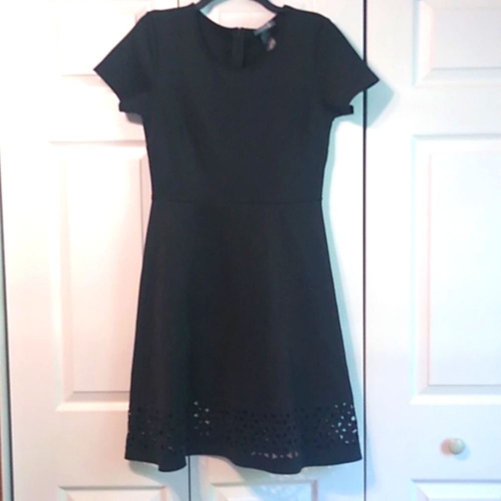 2/$10 Avon Signature Collection black dress with cut outs around bottom